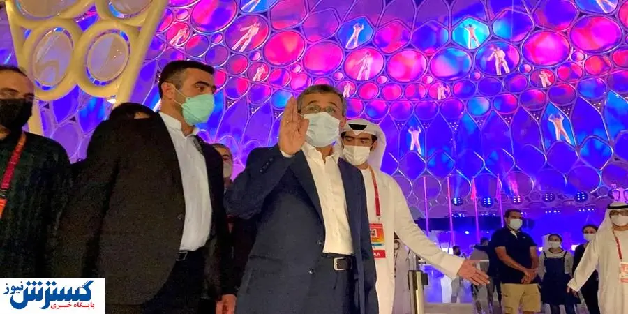 قالی بافی احمدی نژاد کنار خانم ها در دبی + عکس