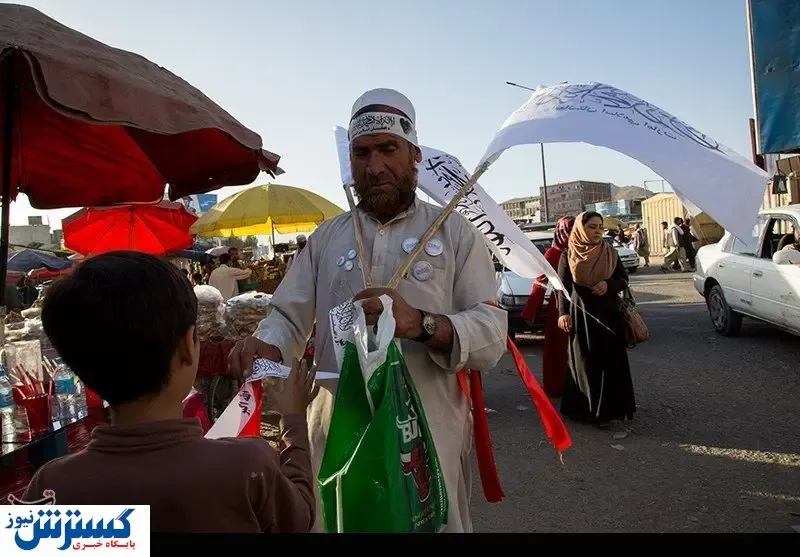 پخش سربند امارت اسلامی در کابل + عکس